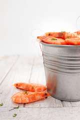 Shrimps in the zinc bucket