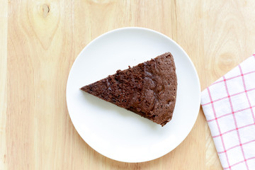 chocolate cake on wood table.