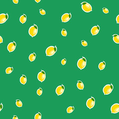 Pattern. small lemon and leaves different sizes on green background.
