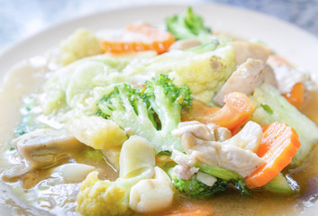 Vegetarian stir fry on white dish, healthy food