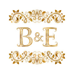 B&E vintage initials logo symbol. Letters B, E, ampersand surrounded floral ornament. Wedding or business partners initials monogram in royal style.