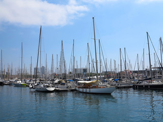 Fototapeta na wymiar 11.07.2016, Barcelona, Spain: Luxury sail yachts in sea port