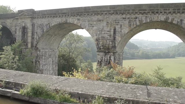 Scenic shot of the world famous Chirk Aqueduct built in 1801 by Thomas Telford. This impressive canal aqueduct has a bigger brother by the side for rail transportation. Located on the Llangollen Canal