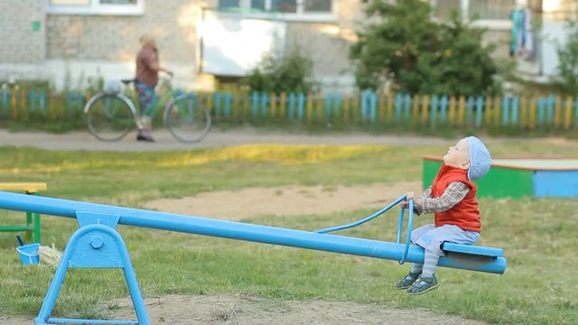 Mother and son on the Playground, play with children's constructions