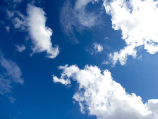 White clouds in a dark blue sky in Europe