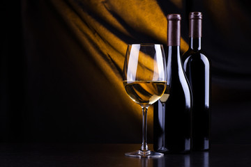 Wine bottles and a glass