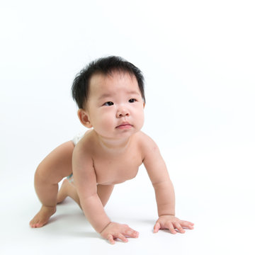 Asian baby crawling