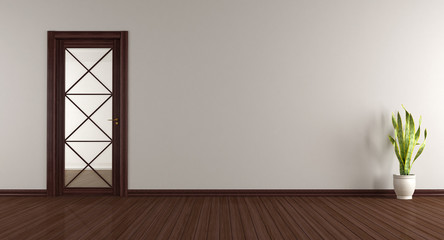 Empty room with wooden glass door