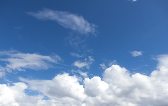 White clouds in a dark blue sky in Europe