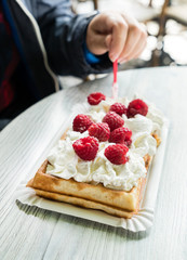 women eating belgian waffles