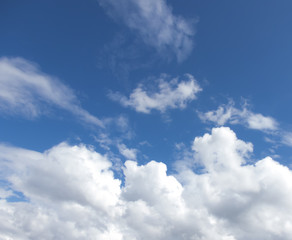 Obraz premium White clouds in a dark blue sky in Europe