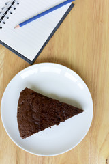 chocolate cake on wood table.