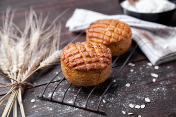 Delicious pastry on dark wooden background