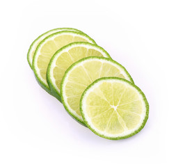 Green lemon slice isolated on white background