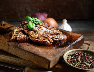 juicy grilled steaks on a cutting board