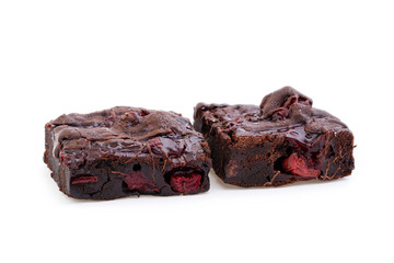 Delicious vegetarian brownie with cherries isolated on white bac