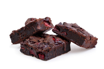 Delicious vegetarian brownie with cherries isolated on white bac