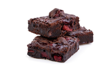 Delicious vegetarian brownie with cherries isolated on white bac