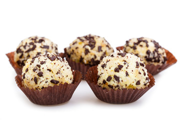Homemade vegetarian truffle candies isolated on white background