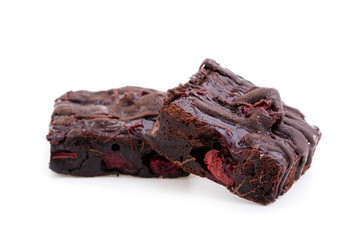 Delicious vegetarian brownie with cherries isolated on white bac