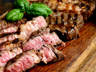 juicy grilled steaks on a cutting board