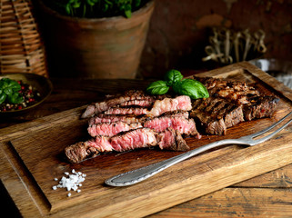 juicy grilled steaks on a cutting board