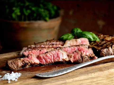 juicy grilled steaks on a cutting board