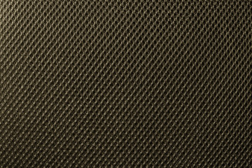 Deep yellow fishnet cloth material as a texture background. Nylon texture pattern or nylon background for design with copy space for text or image.
