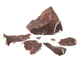 Chocolate pieces close-up isolated on a white background.