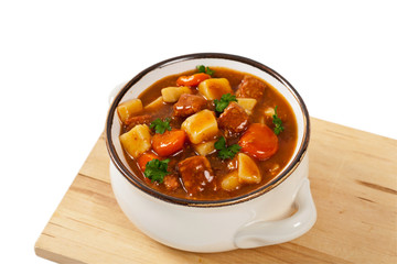 Slow Cooker Beef Stew Isolated on white. Selective focus.