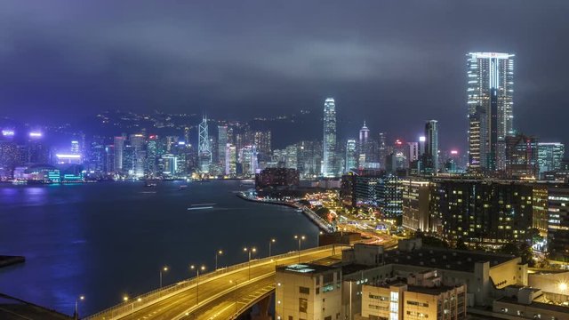 Time Lapse of the tall skyscrapers and harbor of Hong Kong.
