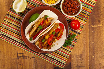 Fajita Chicken Tacos with Grilled Onions and Bell Peppers. Selective focus.