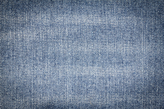 Denim jeans texture or denim jeans background of fashion jeans design with copy space for text or image. Dark edged.