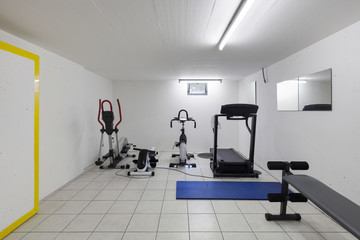 Fototapeta na wymiar Interior, garage with fitness equipment