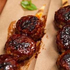 Sweet BBQ Meatballs in Barbecue Sauce. Selective focus.
