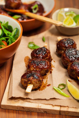 Sweet BBQ Meatballs in Barbecue Sauce. Selective focus.