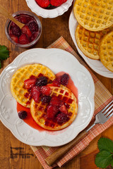 Waffles with Fresh Strawberry Syrup. Selective focus.