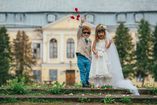 two funny little bride and groom