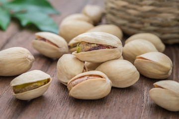 Pistachios on wooden table