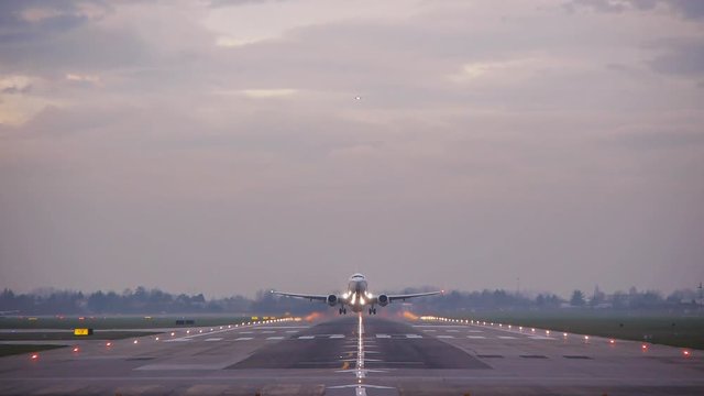 airplane taking off passing over head  at bologna airport,tracking shot,bologna airport 