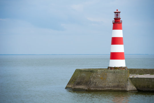 Lighthouse in Nida, Curonian Spit and Curonian Lagoon, Nida, Klaipeda, Lithuania. Nida harbour. Baltic Dunes. Unesco heritage.