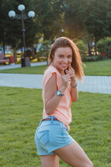 Fototapeta premium Closeup Portrait of a Happy Young Woman Smiling