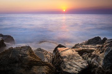 Rock on the beach at Chonburi, Thailand.