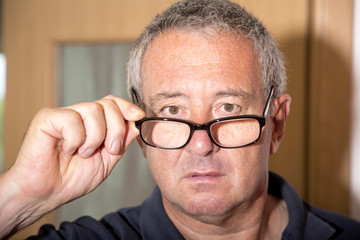 Portrait of a man with glasses