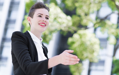 Modern business woman shake hand