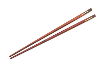 Wooden chopsticks on white background.