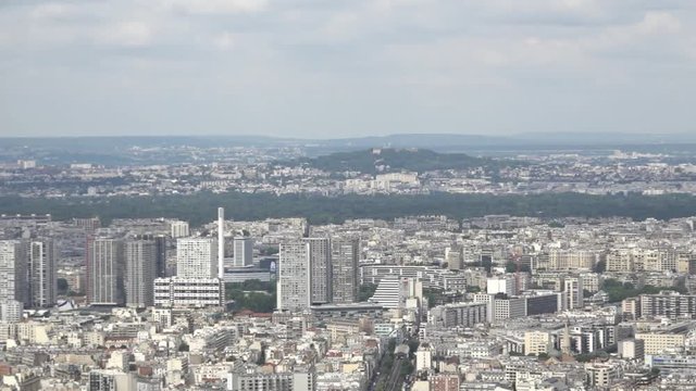 City of Paris Panoramic Shot To Eiffel Tower Monument, 60fps. The Montparnasse Tower Panoramic Observation Deck has the most beautiful view of Paris.