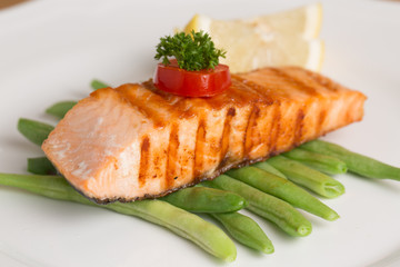 Grill Salmon steak with lemon and vegetable prepare to serve