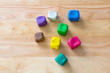 colorful cubes on wood table