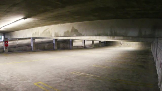 Security camera footage of a car being broken into.